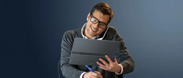 YODOIT promotional banner — professional using a portable monitor in a studio